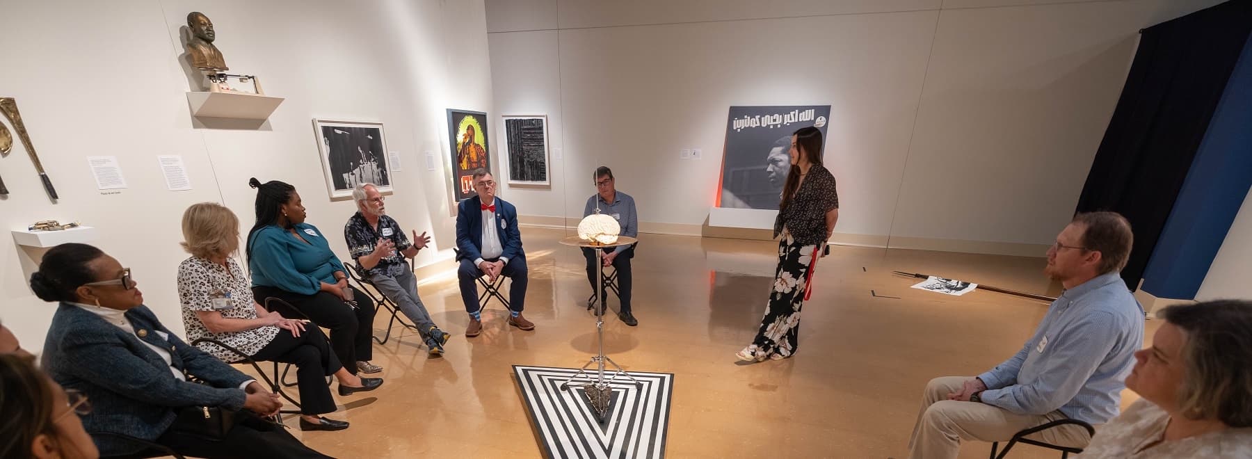Members of the Academy of Excellence in Education meet at museum